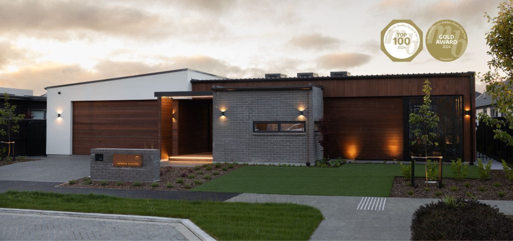 Award winning Oakbridge showhome, modern exterior cladding of Cedar, plaster and brick