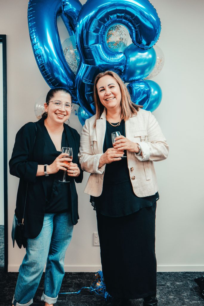 Hallmark Homes team and family celebrating 30 years together