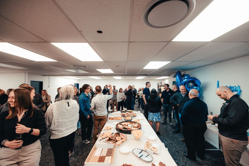 Hallmark Homes team and family celebrating 30 years together